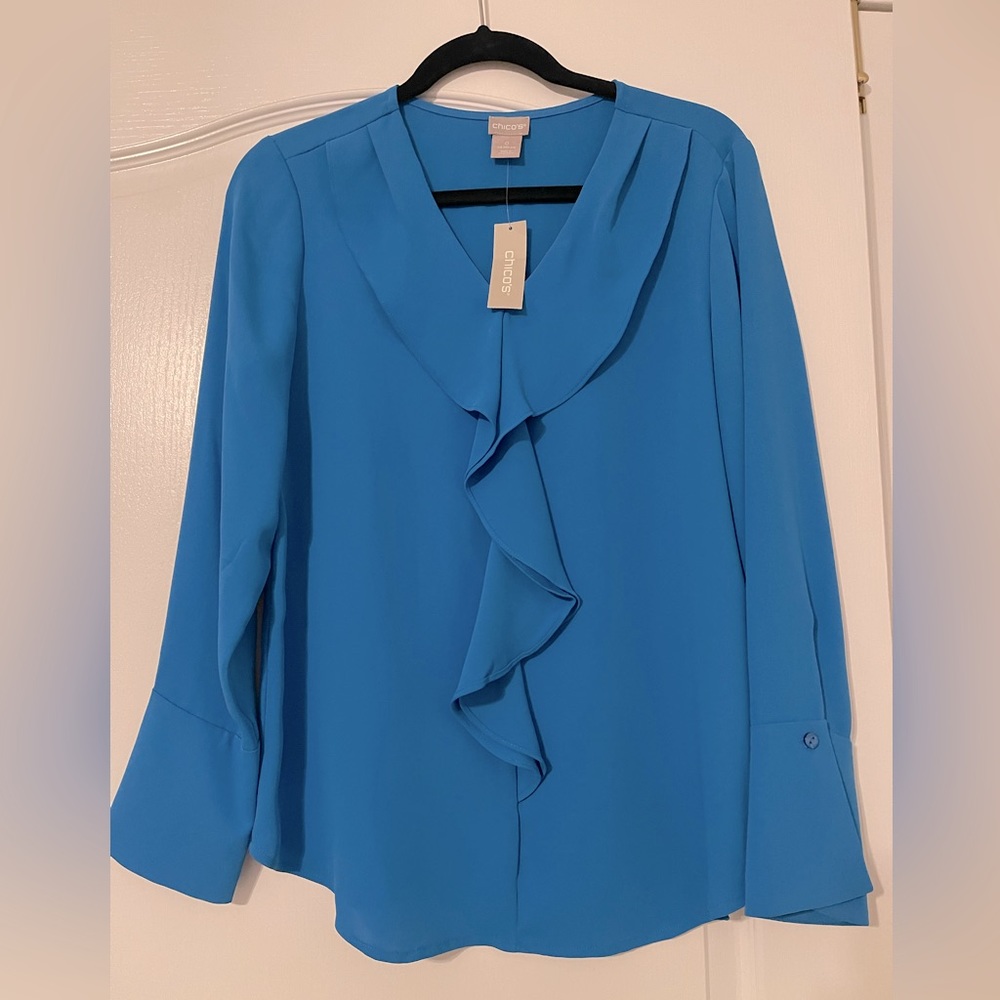 Chico’s blouse 
SIMPLY CYAN
FLOUNCE FRONT TOP
PULLOVER TOP